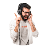 Smiling man in headphones and a gray cardigan raising one hand
