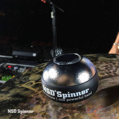 NSD Spinner on a stage table next to audio equipment