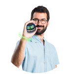 Man in a light blue shirt holding an NSD Spinner and wearing a green wristband